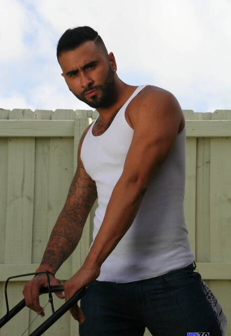 Puerto Rican strongman Rikk York teasing his dick outside