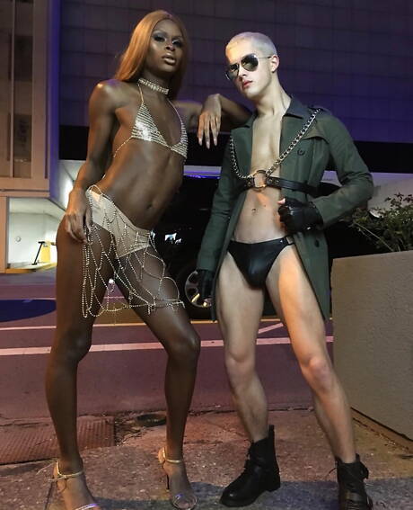 Young bisexuals Calvin Banks and Sean Ford kissing and touching each other