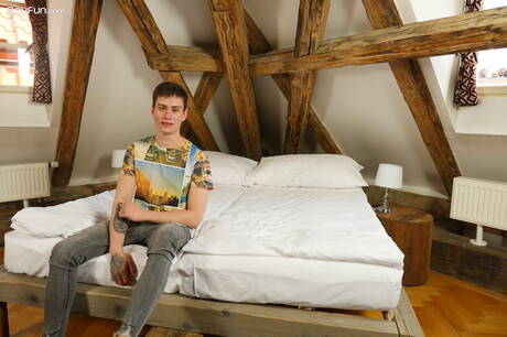 Young boy Evan Ryker undressing and showing nice butt